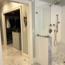unified flooring in master bath and closet