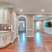 Kitchen corner cabinets and arched doorway