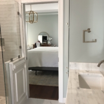 matching gold sphere chandelier in BR