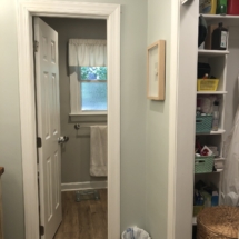 Before - Area opposite vanity held a closet which backed up to the tub/shower area