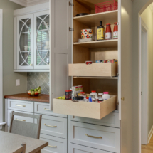 Pantry cabinet with rollout shelves and drawers